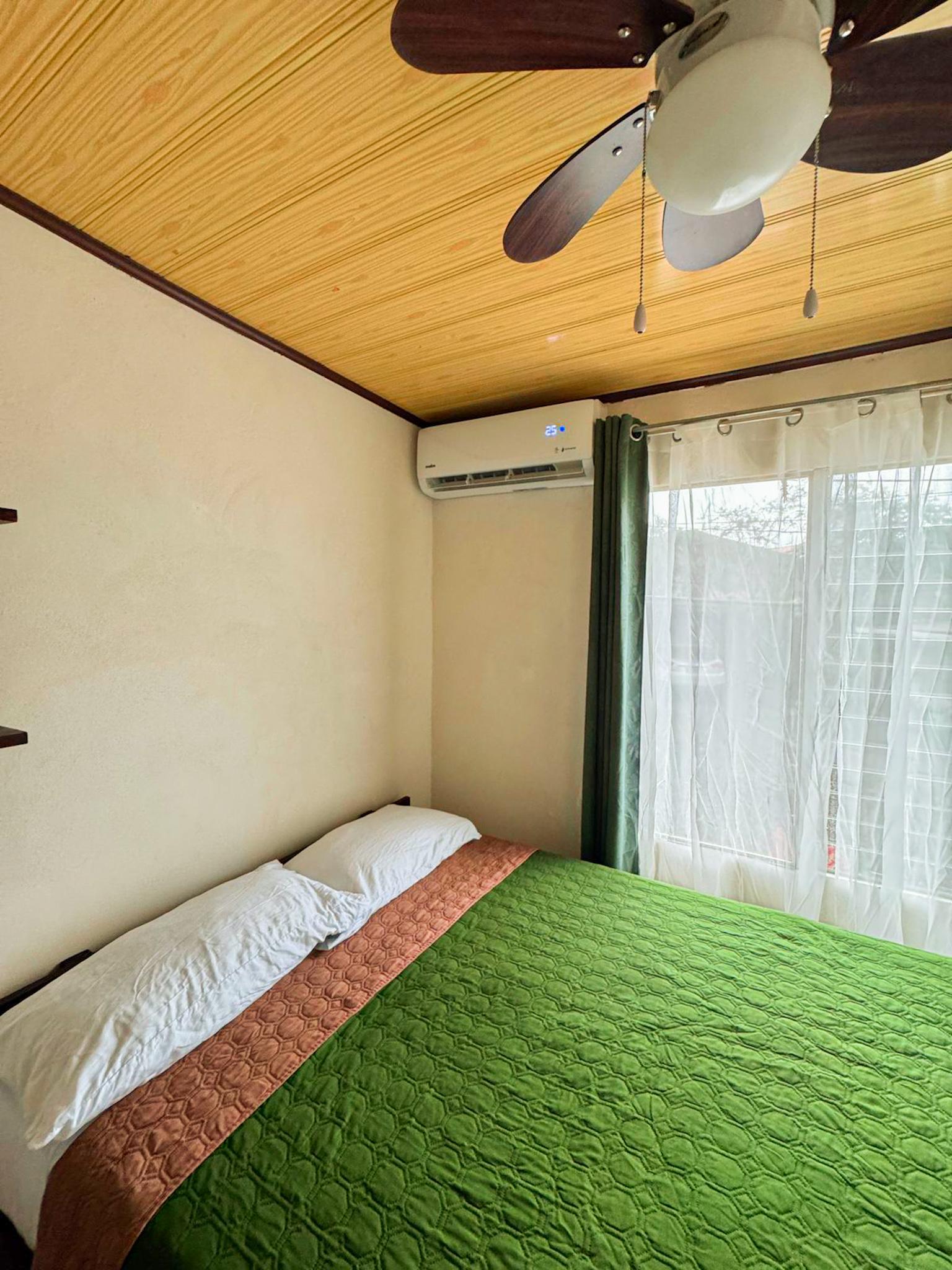 Night view of Guayabón Cabin 2 in La Fortuna