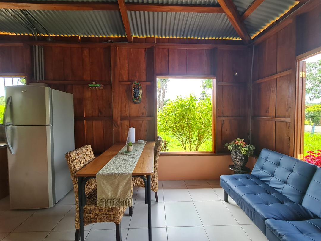 Cabin Eco Container Quaint eco-container cabin bathroom with natural wood and blue tones in La Fortuna.