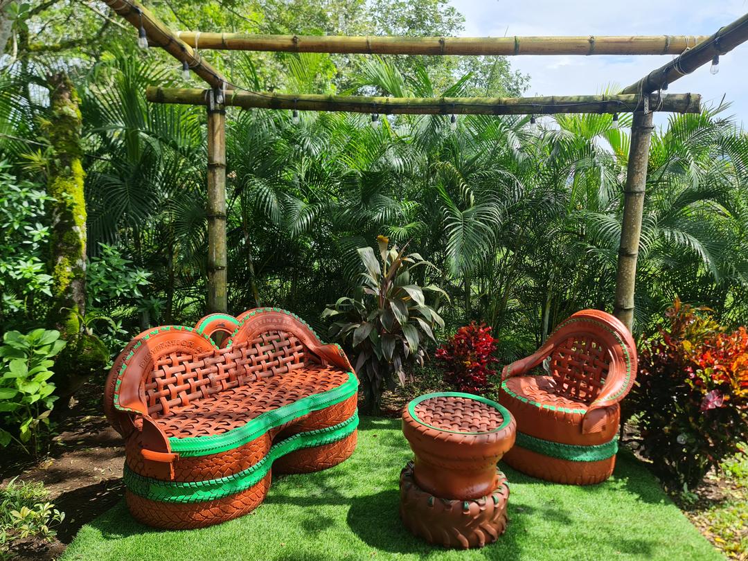 Cabin Eco Container Spacious and inviting eco-container cabin living area with forest views in La Fortuna.